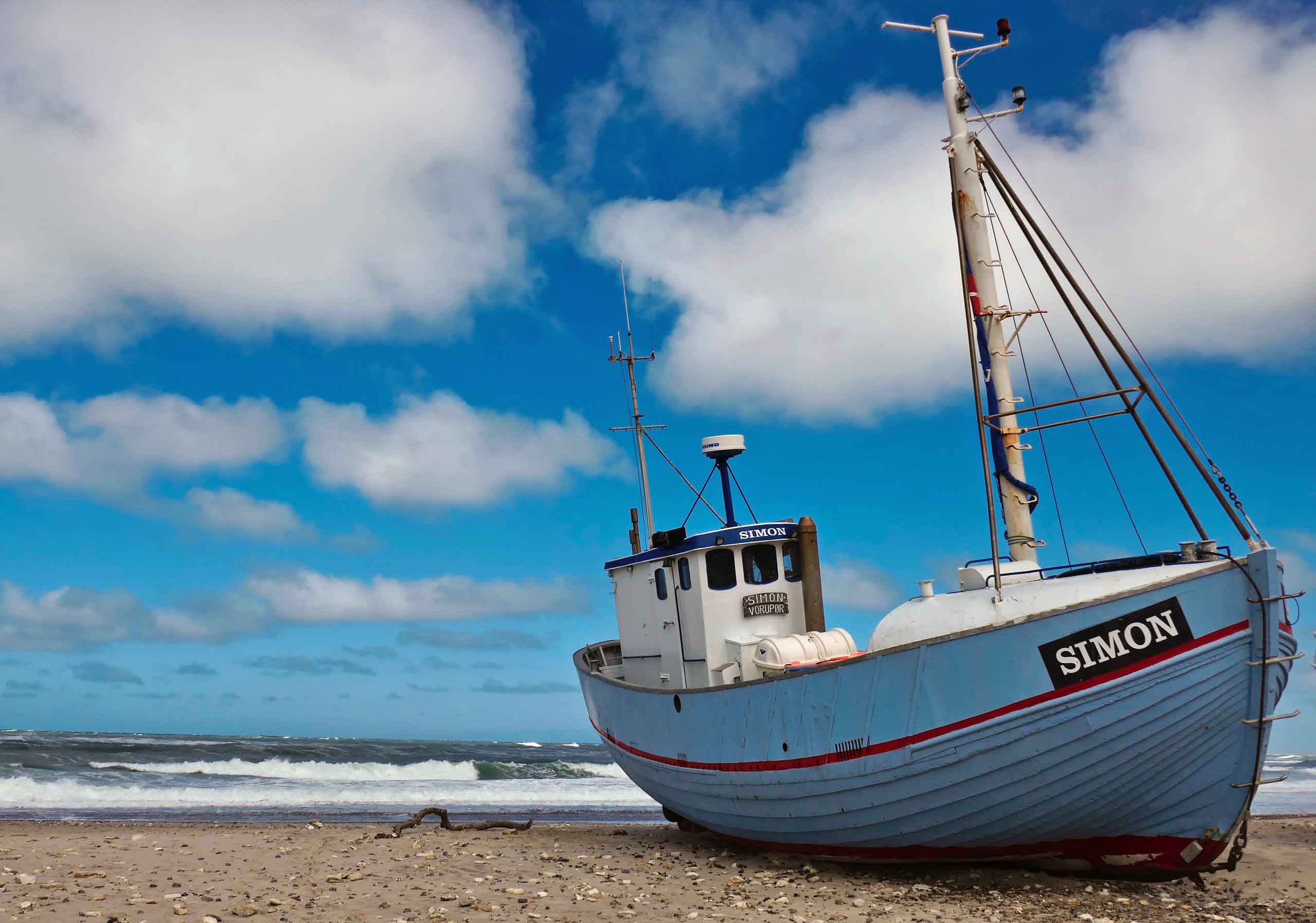 Båd på stranden